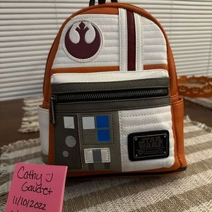 Well Loved Rebels Pilot and Heart Logo Loungefly backpack